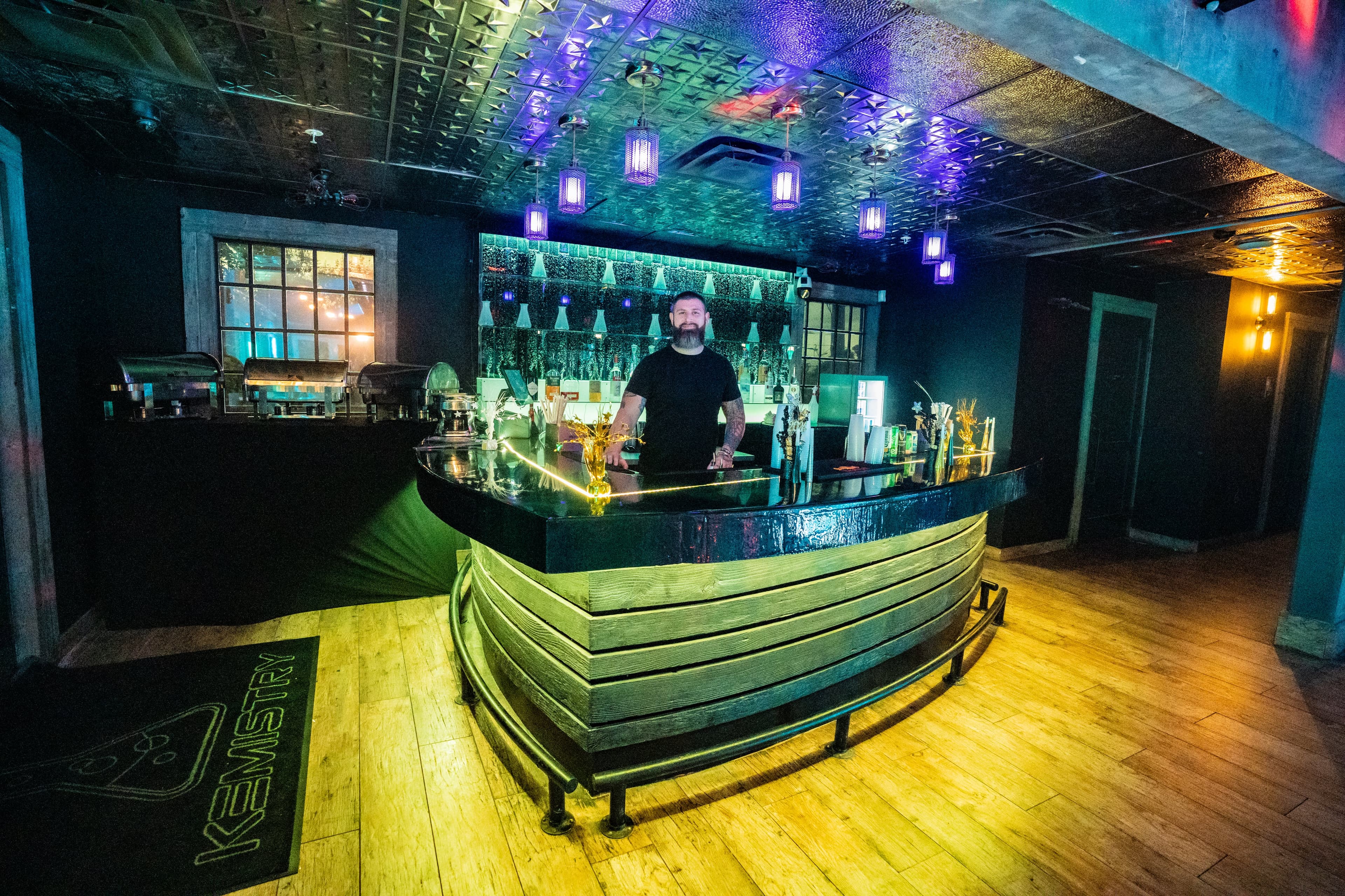 Bartender at the kemistry nightclub venue rental